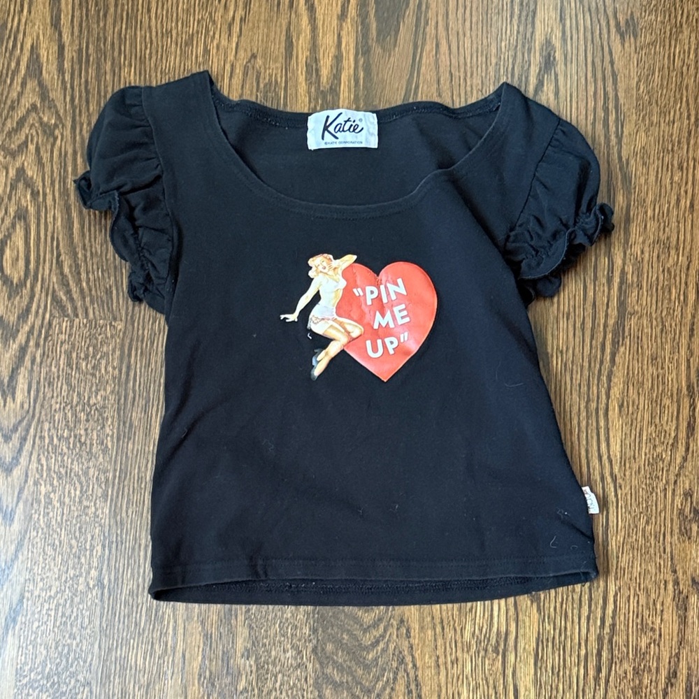 Vintage Black Tee with Red Heart and Pin-Up Design - pricing firm